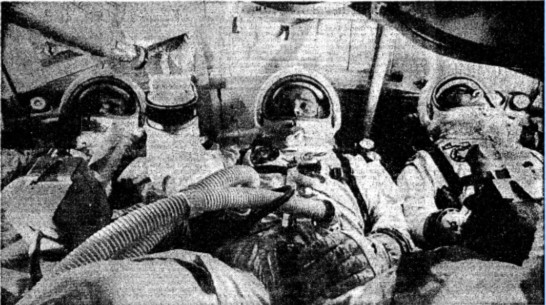 “The astronauts practicing in an Apollo capsule, identical to the one in which they died. From left: Chaffee, White, Grissom.” 