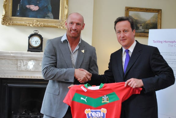 Rugby player Gareth Thomas (left) with David Cameron at an LGTB reception at No.10 to launch a new campaign to kick homophobia and transphobia out of sport. 21 June 2011.