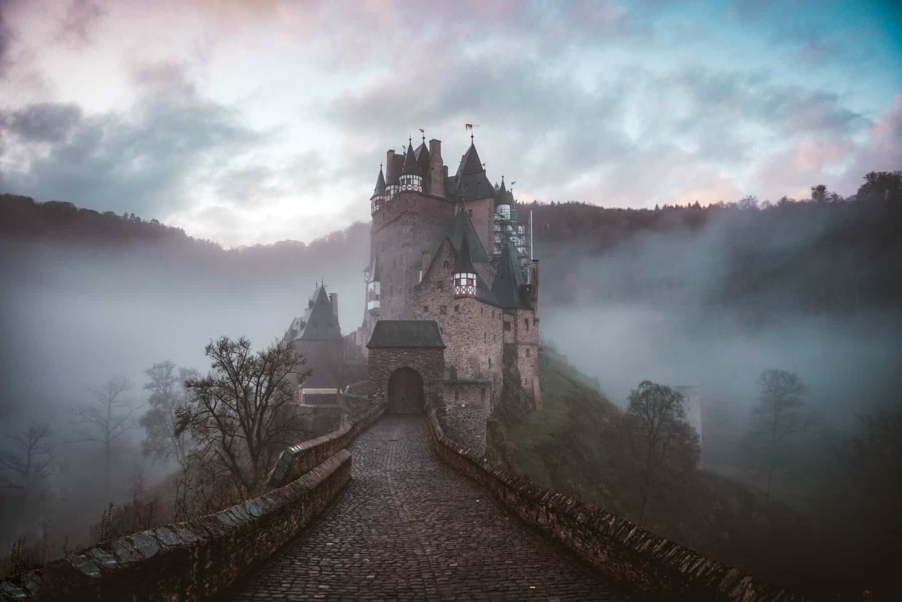 Gothic castle shrouded in mist