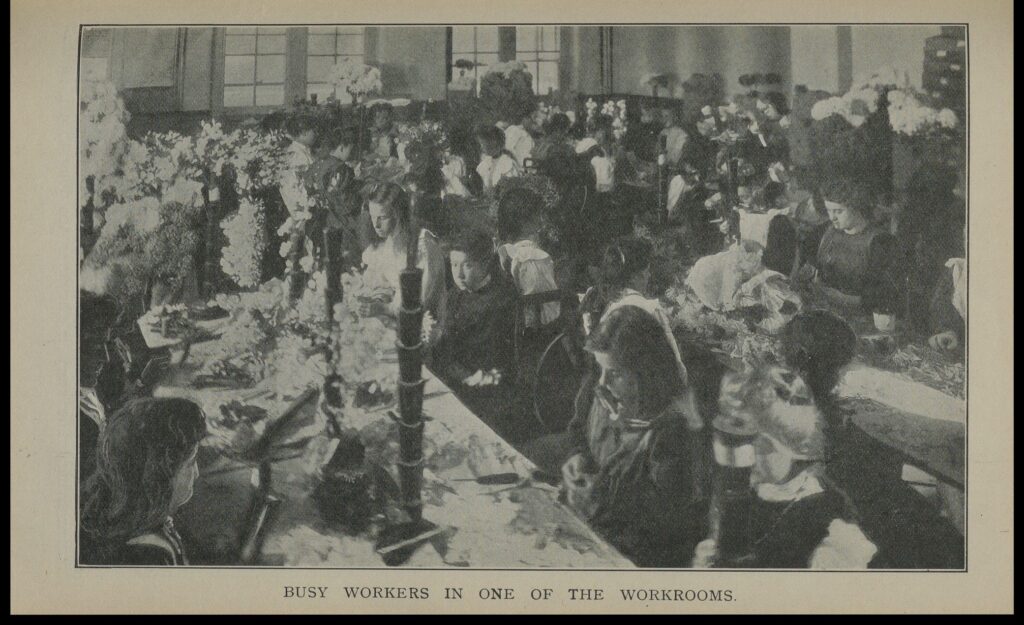 Image of Flower girls producing artificial flowers in one of Groom's workrooms.